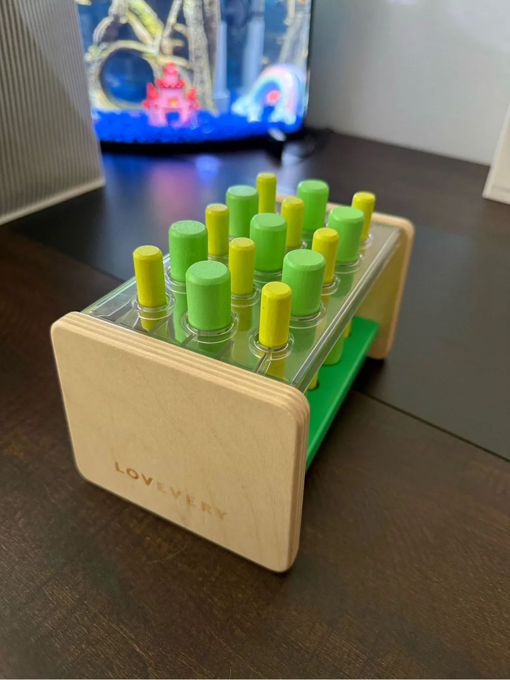 LOVEVERY Green and Yellow Peg Puzzle Toy